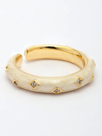 Elegant Enamel-Decorated Zircon Ring