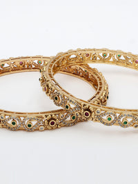 High Gold Finish Bangle Adorned With Ruby, Emerald & Zircon