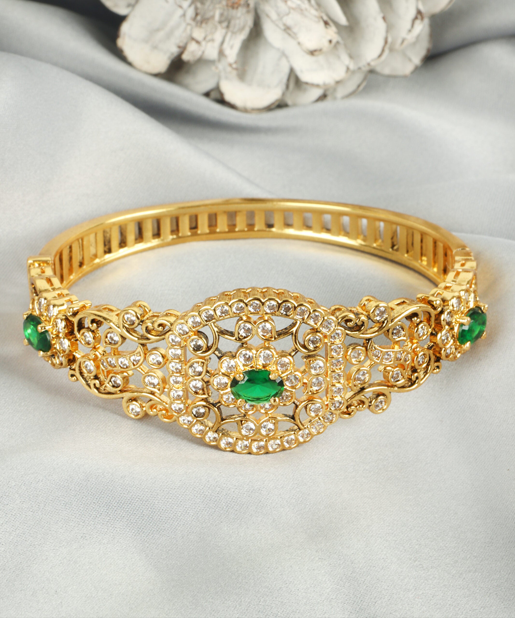Luxurious Gold-Finish Kada with Emerald and Zircon Stones