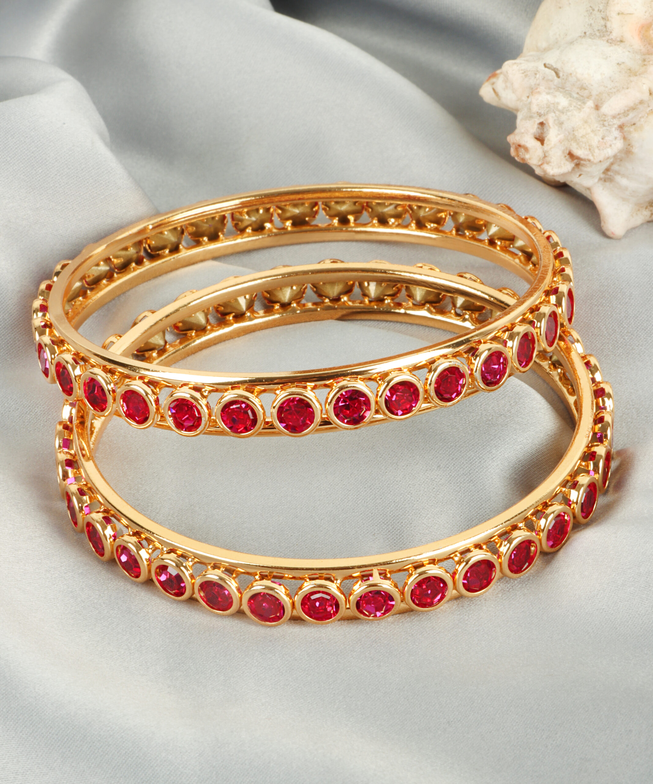 Radiant Zircon Bangles in High Gold Polish